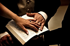 bible and hands